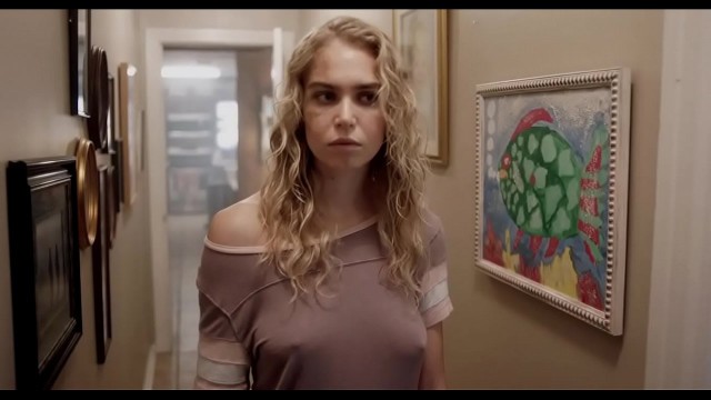 Penelope Mitchell with Nicolas Cage in "Between Worlds