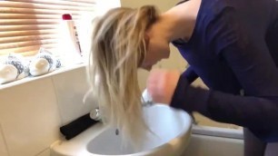 Forward Hair Wash in Bathroon Sink