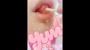 Drooling Girl Eating Yummy Lollipop