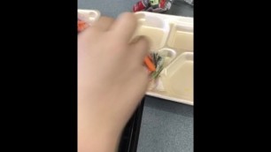 Boy Plays with Bag of Young Sticks of Vegetable Nutrient