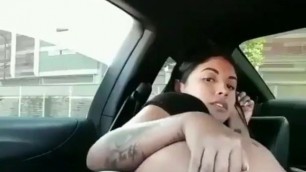 Delicious Latina spreads in a car