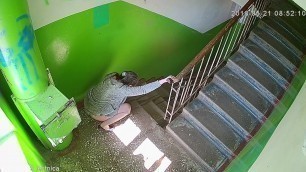 Russian Slag pisses in stairwell