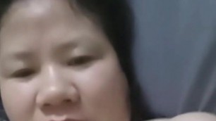 Vietnamese single mum fingering her pussy until she cums