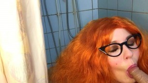 Red-Haired Beauty Sucks Cock In The Bathroom