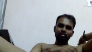 Indian guy wanking his hard cock.