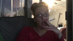 Goddess D Smoking Cork Tip 100 Cigarette outside Wearing Glasses w Hair up